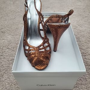 Brand new Calvin Klein Bronze Heals